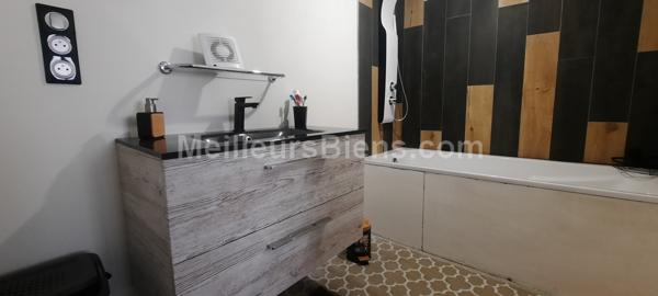 Cette Maison de ville  5 pièces de 140 m2 3 chambres,bureau