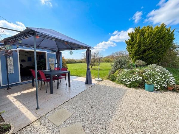 Maison de trois chambres avec grand jardin, garage, dépendance et superbes vues Chatain