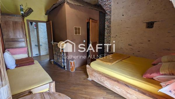 Maison en pierre de 312 m², 11 pièces, 7 chambres.