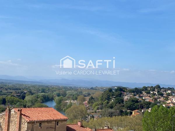 1er étage avec ascenseur et place de parking en centre ville