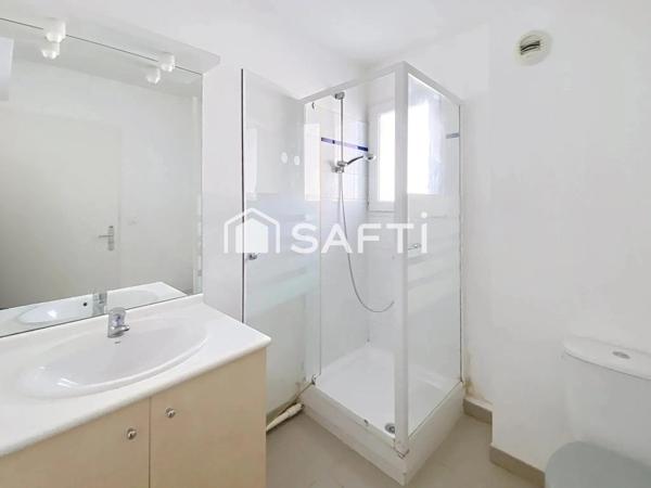 1er étage avec ascenseur et place de parking en centre ville