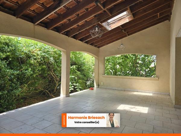 Maison familiale avec grand jardin, terrasse couverte et garage
