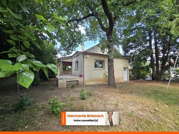 Maison familiale avec grand jardin, terrasse couverte et garage