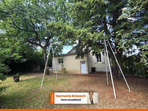 Maison familiale avec grand jardin, terrasse couverte et garage