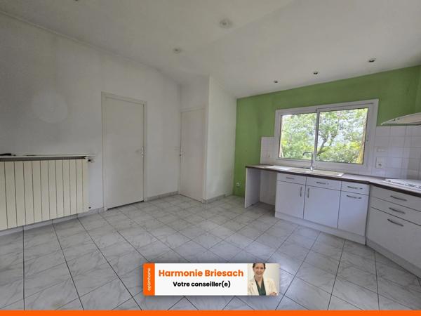 Maison familiale avec grand jardin, terrasse couverte et garage