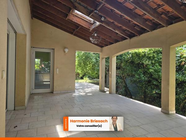 Maison familiale avec grand jardin, terrasse couverte et garage