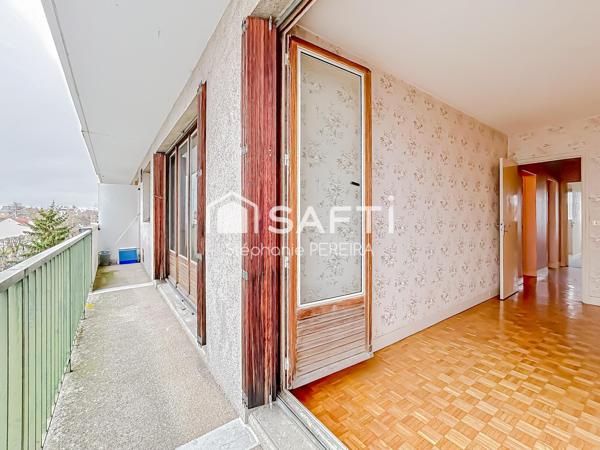 Appartement spacieux à rénover avec cave et box