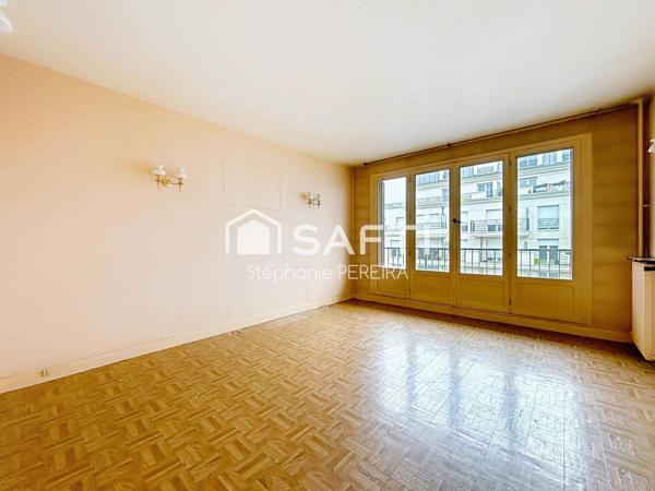 Appartement spacieux à rénover avec cave et box