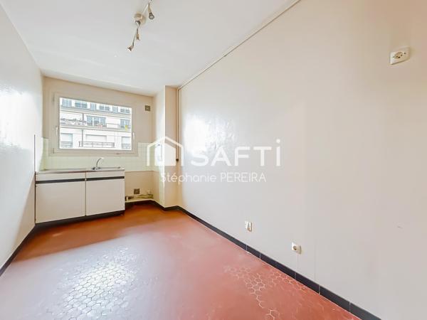 Appartement spacieux à rénover avec cave et box