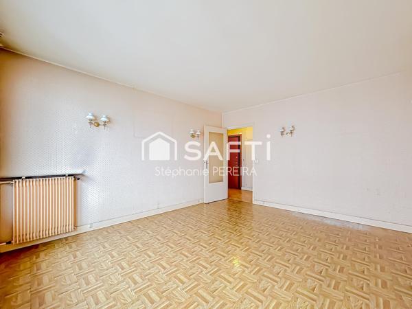 Appartement spacieux à rénover avec cave et box