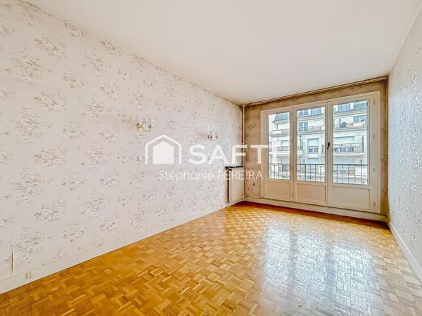 Appartement spacieux à rénover avec cave et box