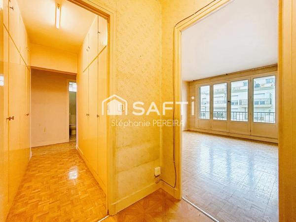 Appartement spacieux à rénover avec cave et box