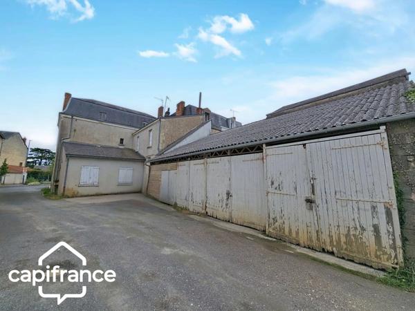 Thouars centre – Bien à rénover 210 m² avec 3 garages – Fort potentiel locatif