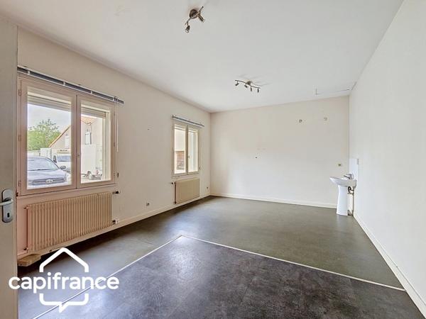 Thouars centre – Bien à rénover 210 m² avec 3 garages – Fort potentiel locatif