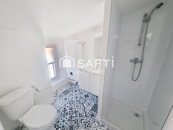 Immeuble de 6 appartements rénovés + local, garage