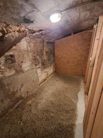 Grande cave dans copropriété sécurisée