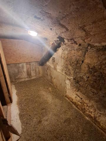 Grande cave dans copropriété sécurisée