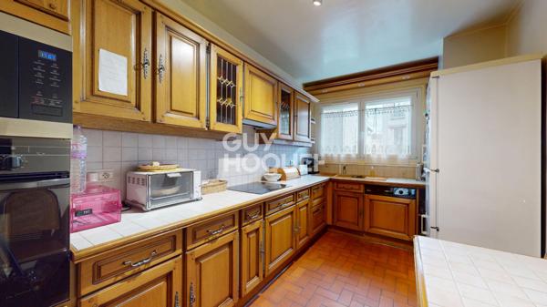 Grand 5 pièces avec balcons et cave dans un quartier recherché