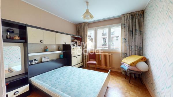 Grand 5 pièces avec balcons et cave dans un quartier recherché