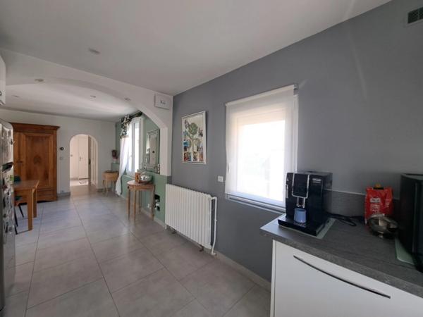 PLAIN-PIED DANS UN QUARTIER PRISE