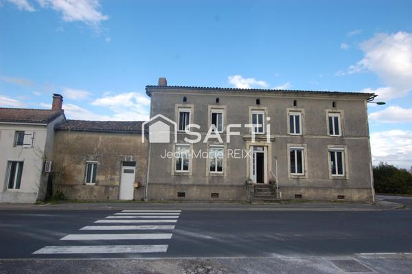 Grande maison de ville 230 m² – Fort potentiel – Jardin et grange