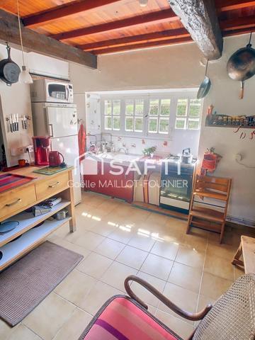 Charmante maison en pierres avec grand jardin
