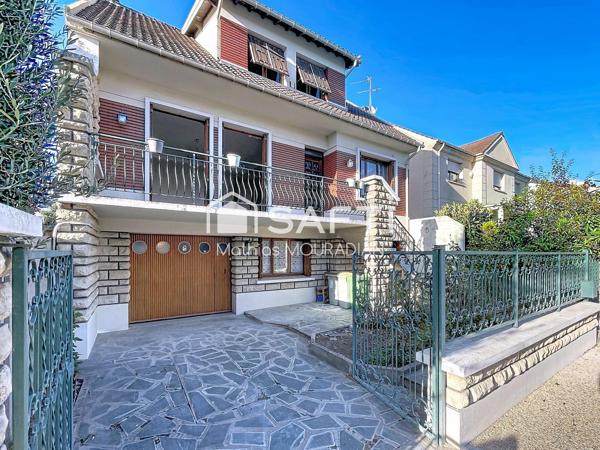 Maison avec jardin et garage à 2 pas du RER D.