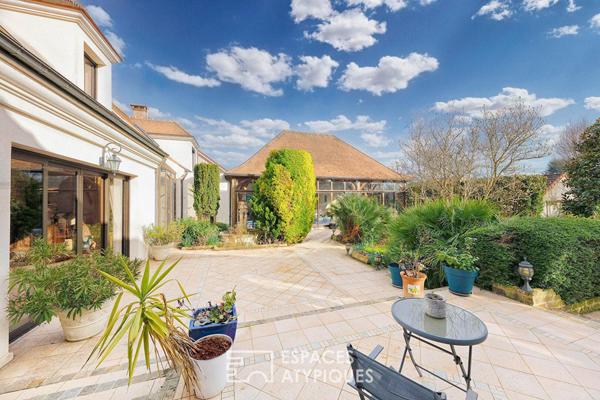 Villa Prestige aux Volumes Spectaculaires en coeur de ville