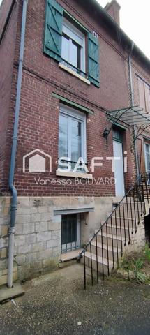 Maison mitoyenne rénovée avec jardin et sous-sol aménagé