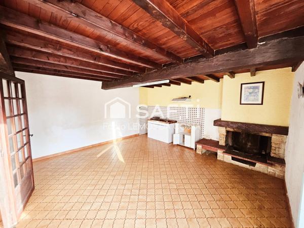 MAISON PROCHE TOUS COMMERCES AVEC JARDIN ET GARAGE