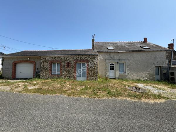 Maison à vendre à MONTRELAIS - 3 chambres, belle pièce de vie, garage, jardin