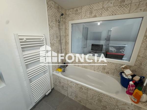 Location Appartement 3 pièces 69.8 m² - 2-4 RUE SIMONE DE BEAUVOIR Lyon 69007