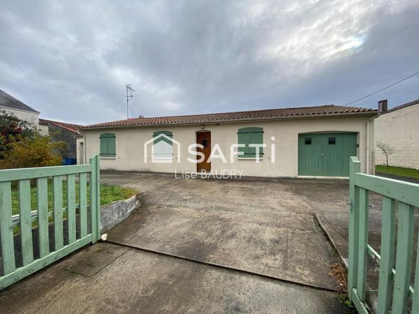 Plain-pied de trois chambres avec jardin et garages