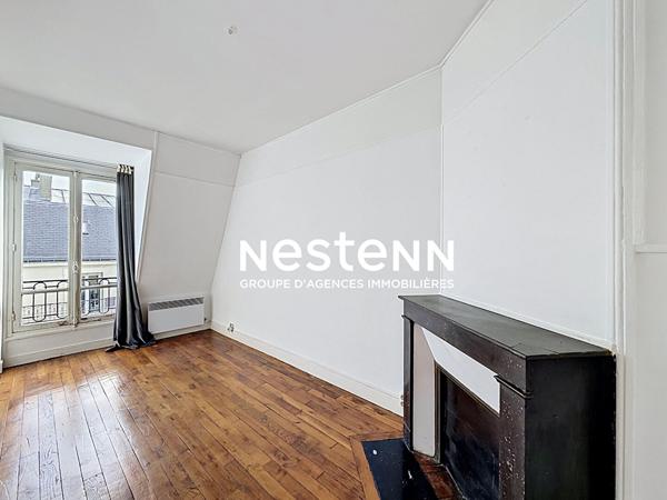 Dernier étage avec vue Tour Eiffel ? 3 pièces de charme de 60,91 m² au sol ? Ascenseur prochainement installé