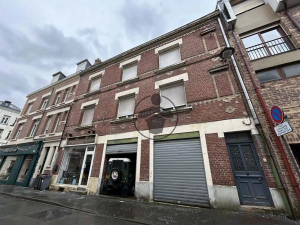 Vente                                                      Immeuble
                        
                     8 pièces                      132 m2                     à Saint-Quentin
