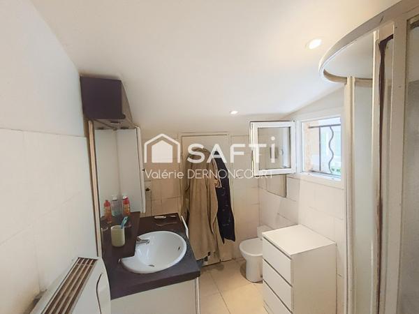 Maison de ville proche de tous commerces