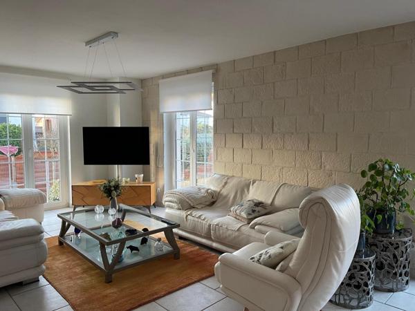 À vendre une propriété rare de 9 pièces alliant espace, confort et qualité de vie sur Pfastatt.