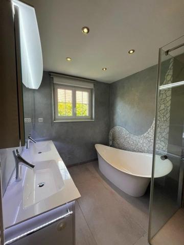 À vendre une propriété rare de 9 pièces alliant espace, confort et qualité de vie sur Pfastatt.
