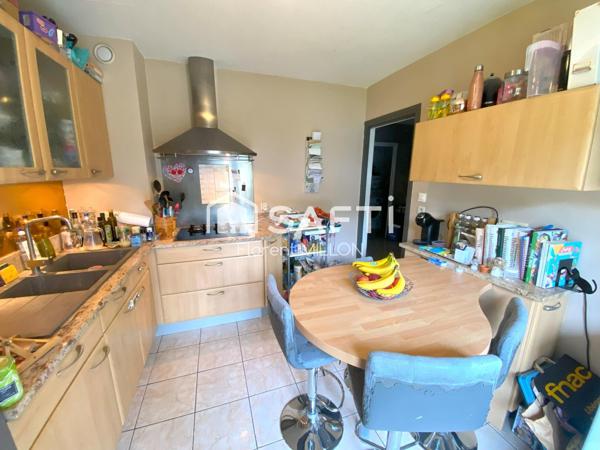 T4 avec ascenseur proche centre ville.