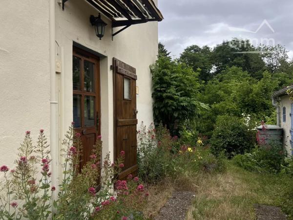 Maison de charme avec parc arboré de 2951 m²
