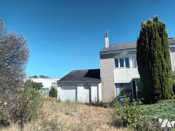 Maison de ville avec 3 chambres et grand garage