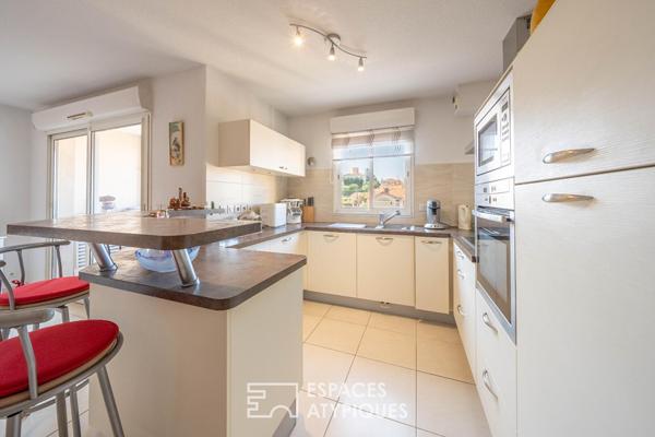 Appartement traversant avec balcon et garage