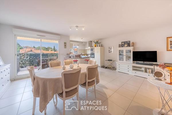 Appartement traversant avec balcon et garage