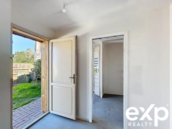 Appartement duplex avec jardin privatif