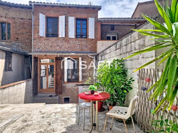 Maison de ville de caractère rénovée avec cour et potentiel