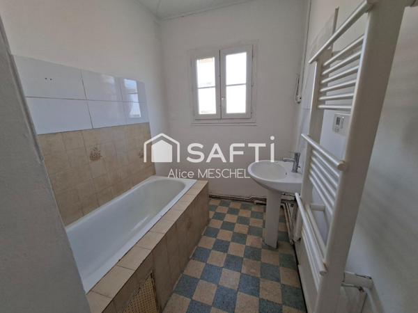 Un appartement T4 -cave- balcon -terrasse-