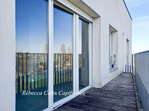 Appartement T2 avec balcon et place de parking