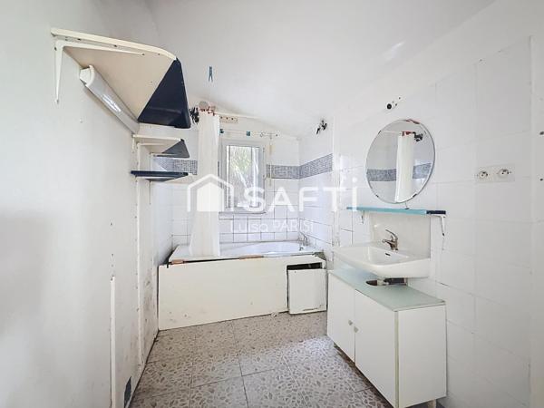 Maison à rénover + terrain 413 m² – fort potentiel