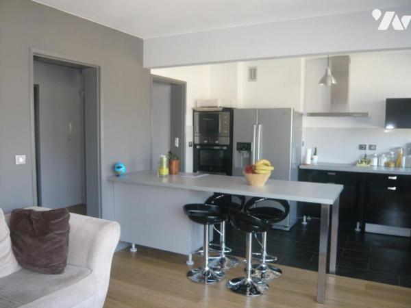 Exclusivité appartement type IV en parfait état rue Carnot avec garage et cave.