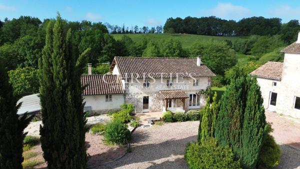 Un domaine rare, entre campagne et village — 14 hectares en un seul tenant